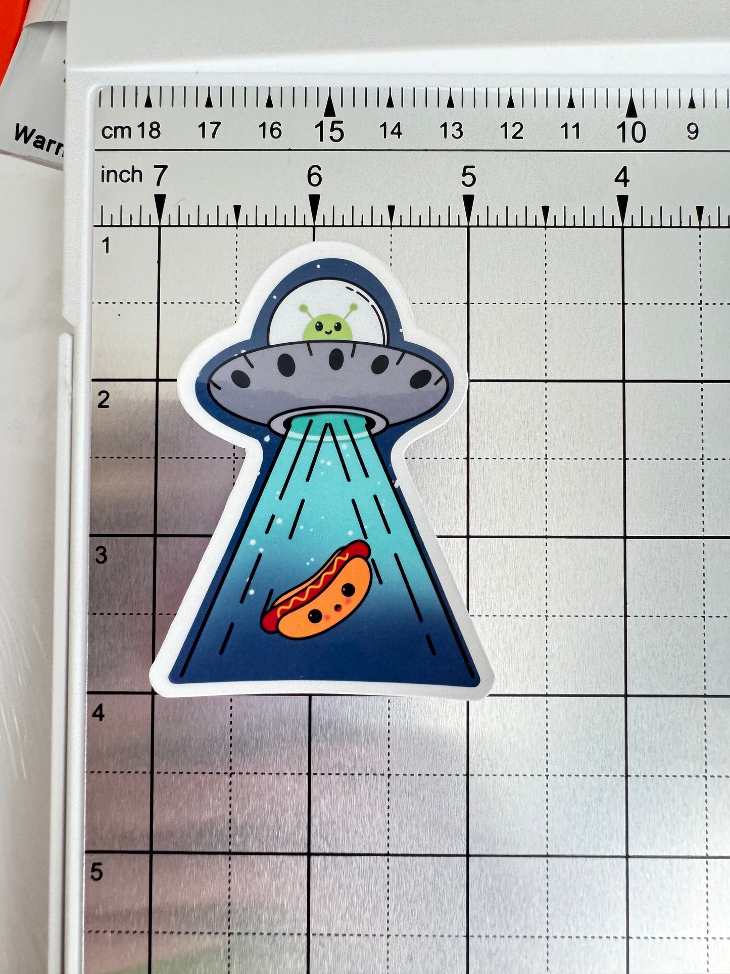 Funny Alien Sticker Abducting a Hot Dog
